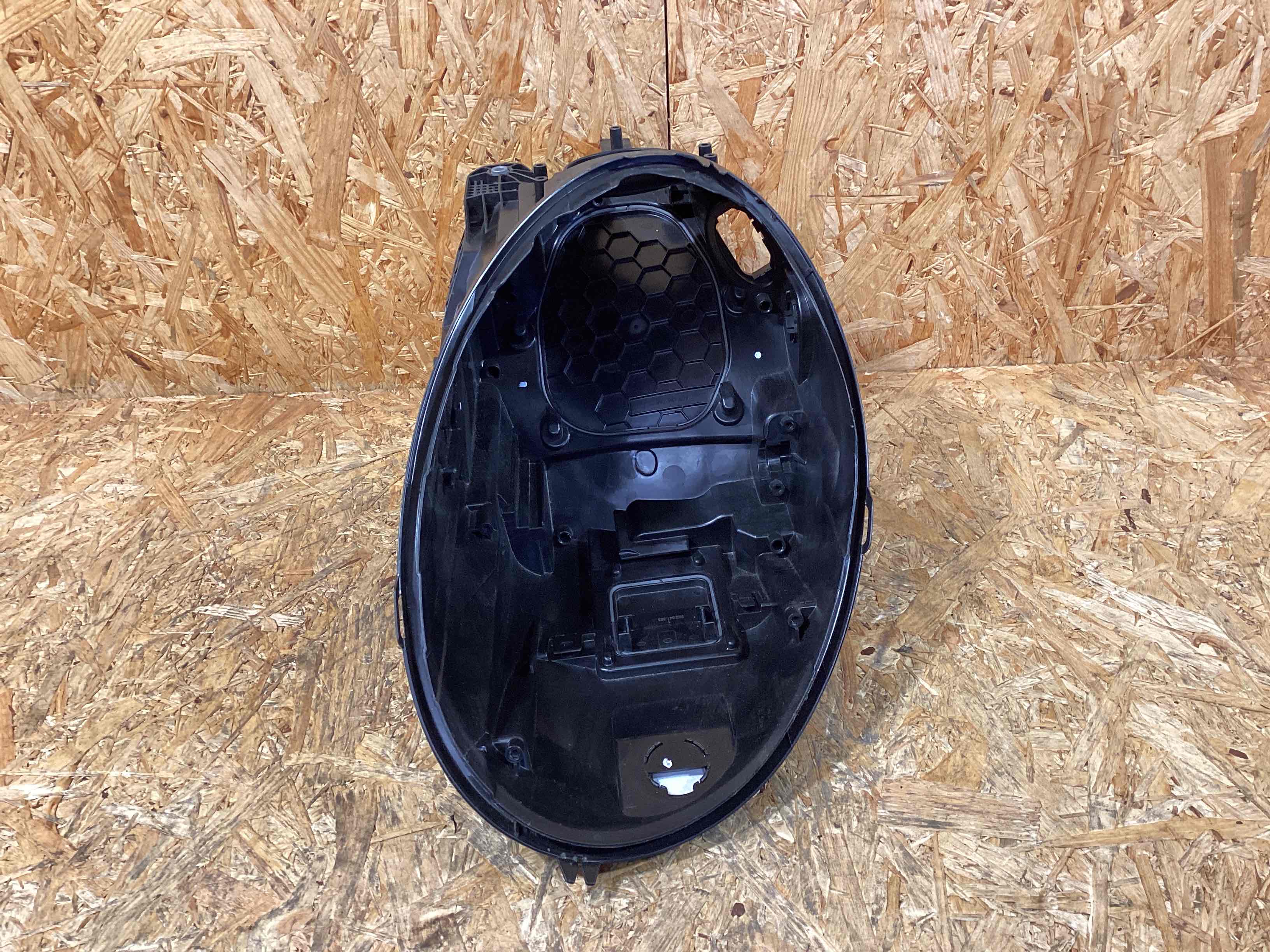 Фара левая Porsche 911 041125-104