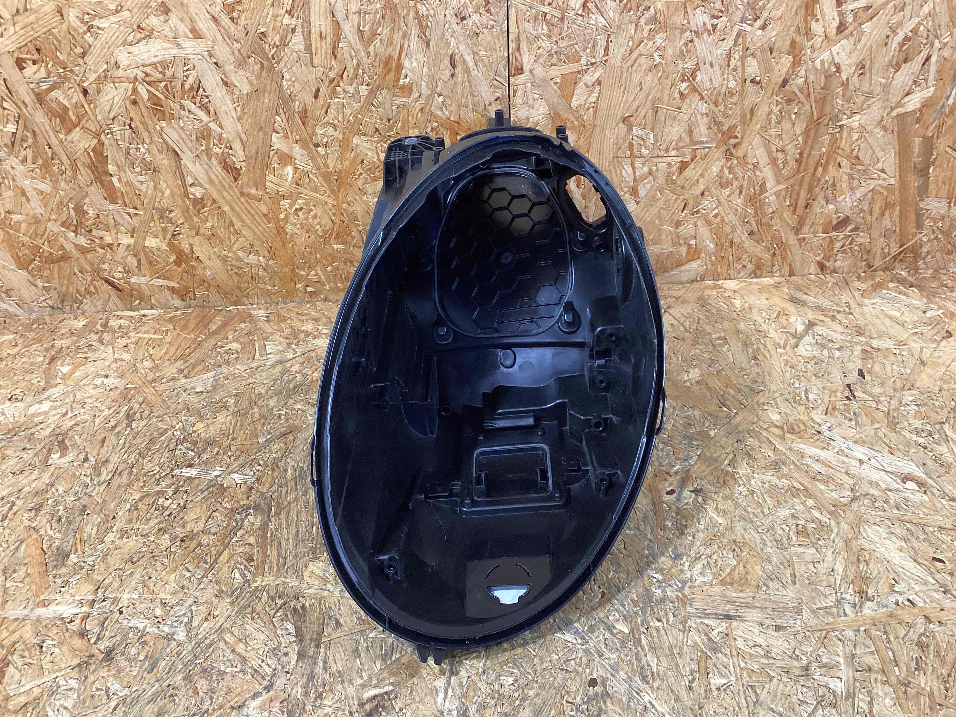 Фара левая Porsche 911 041125-105