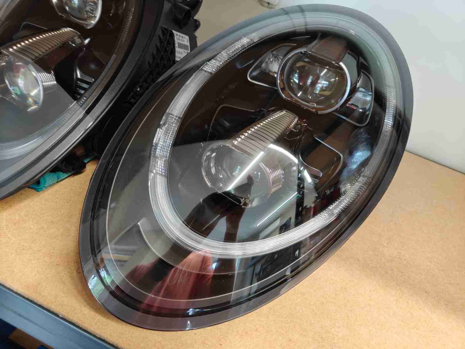 Фара левая Porsche 911 060826-206
