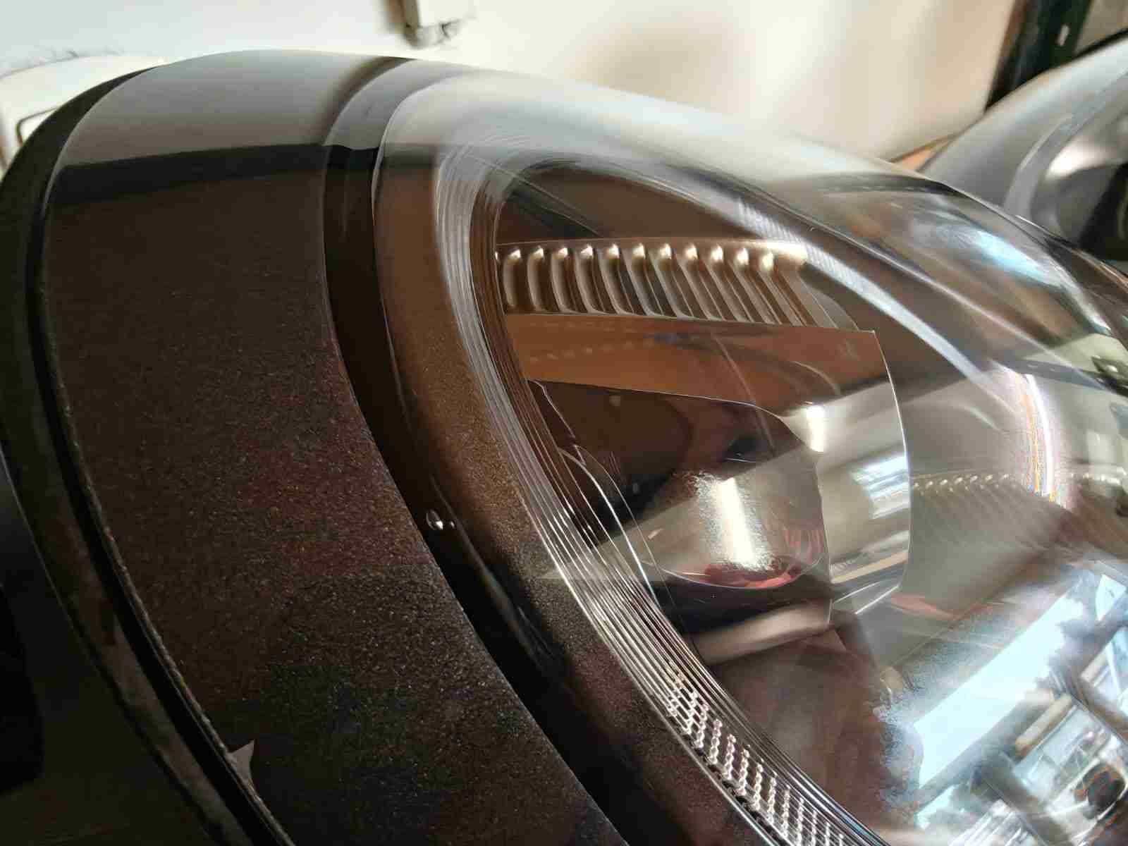 Фара левая Porsche 911 060826-206
