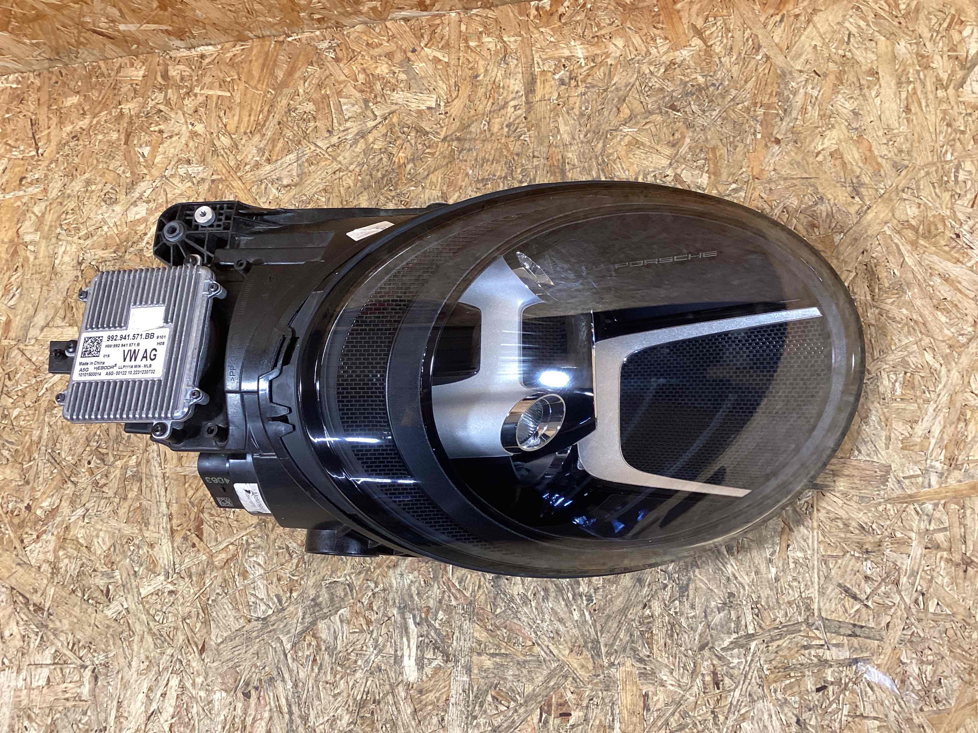 Фара правая Porsche 911 121125-125