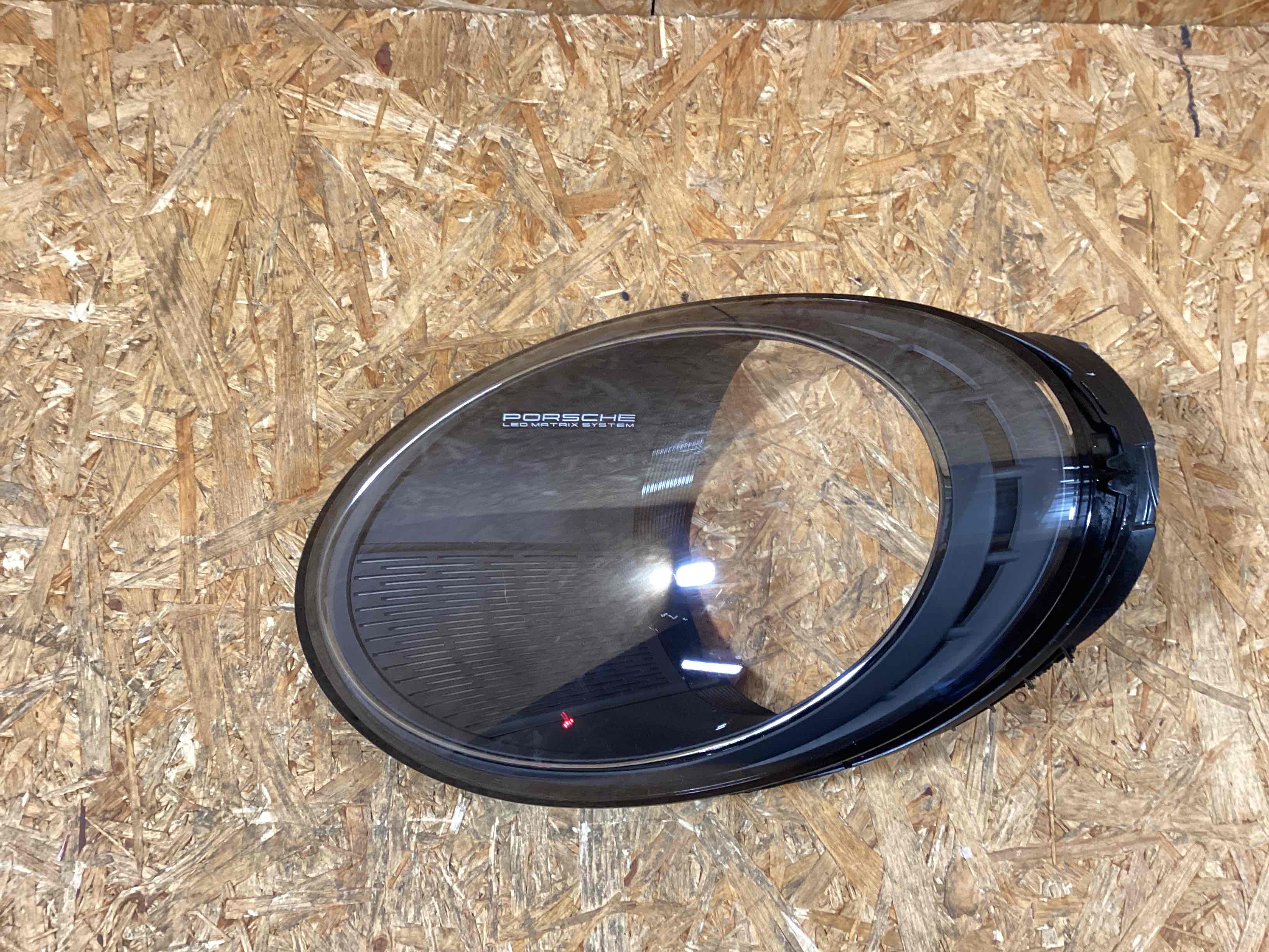 Фара левая Porsche 911 130126-113