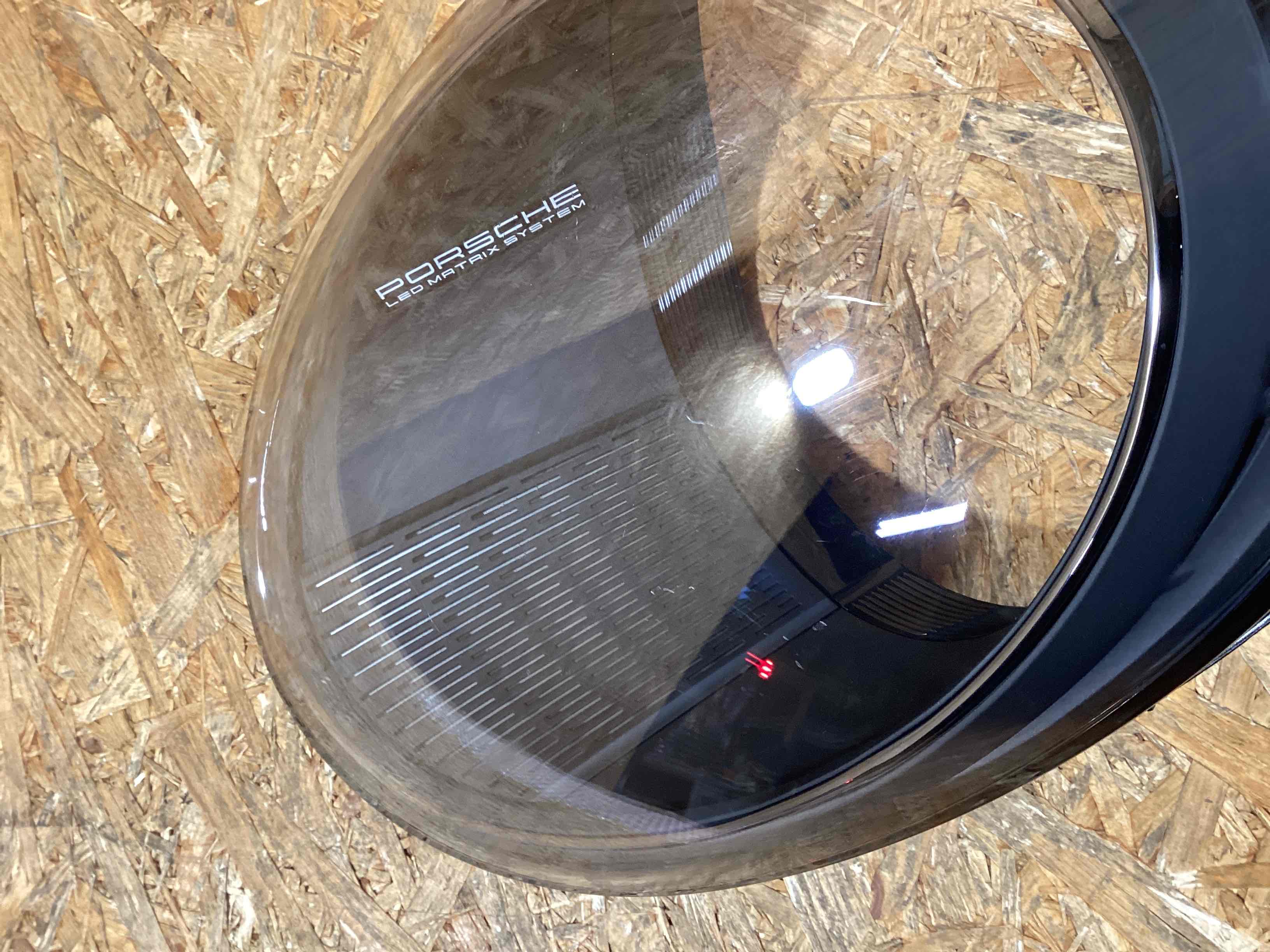 Фара левая Porsche 911 130126-113