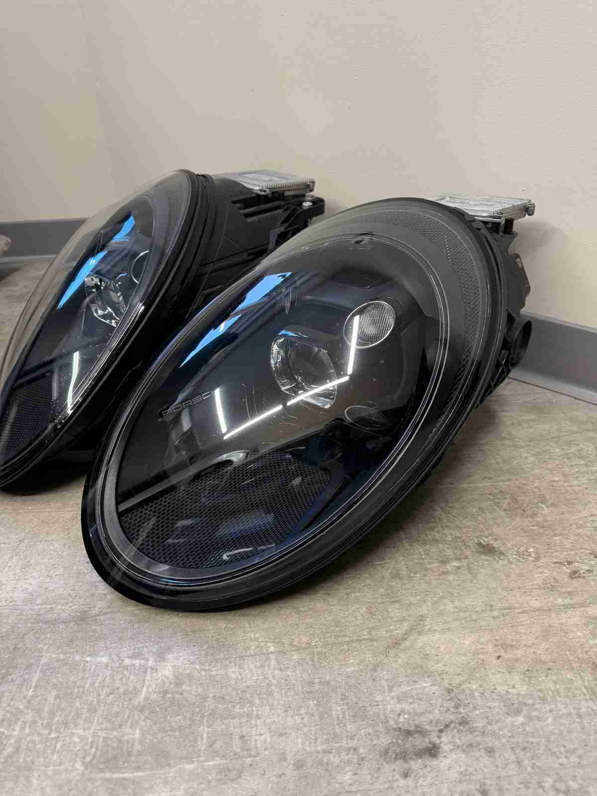 Фара левая Porsche 911 190226-103