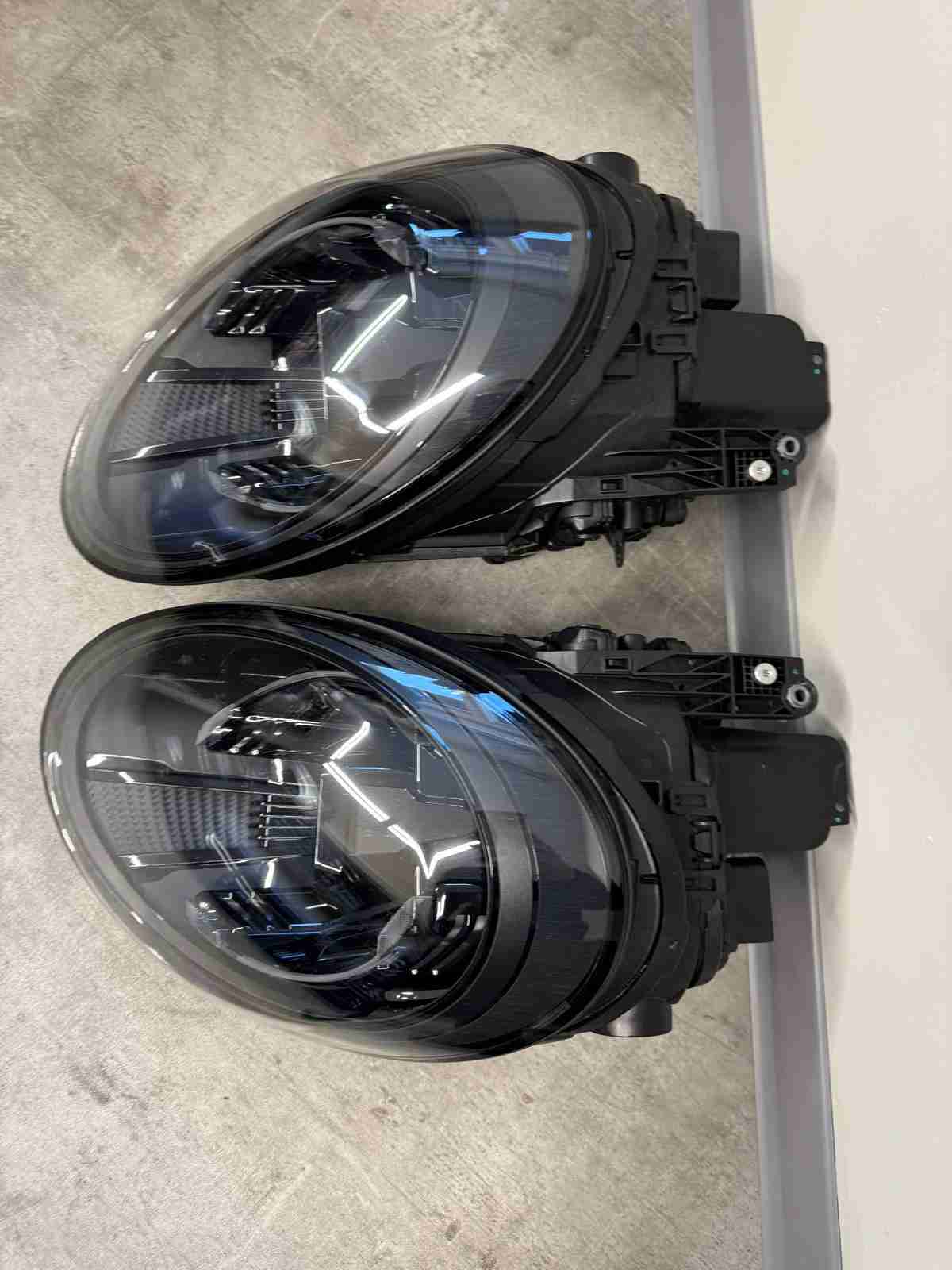 Фара левая Porsche 911 190226-103