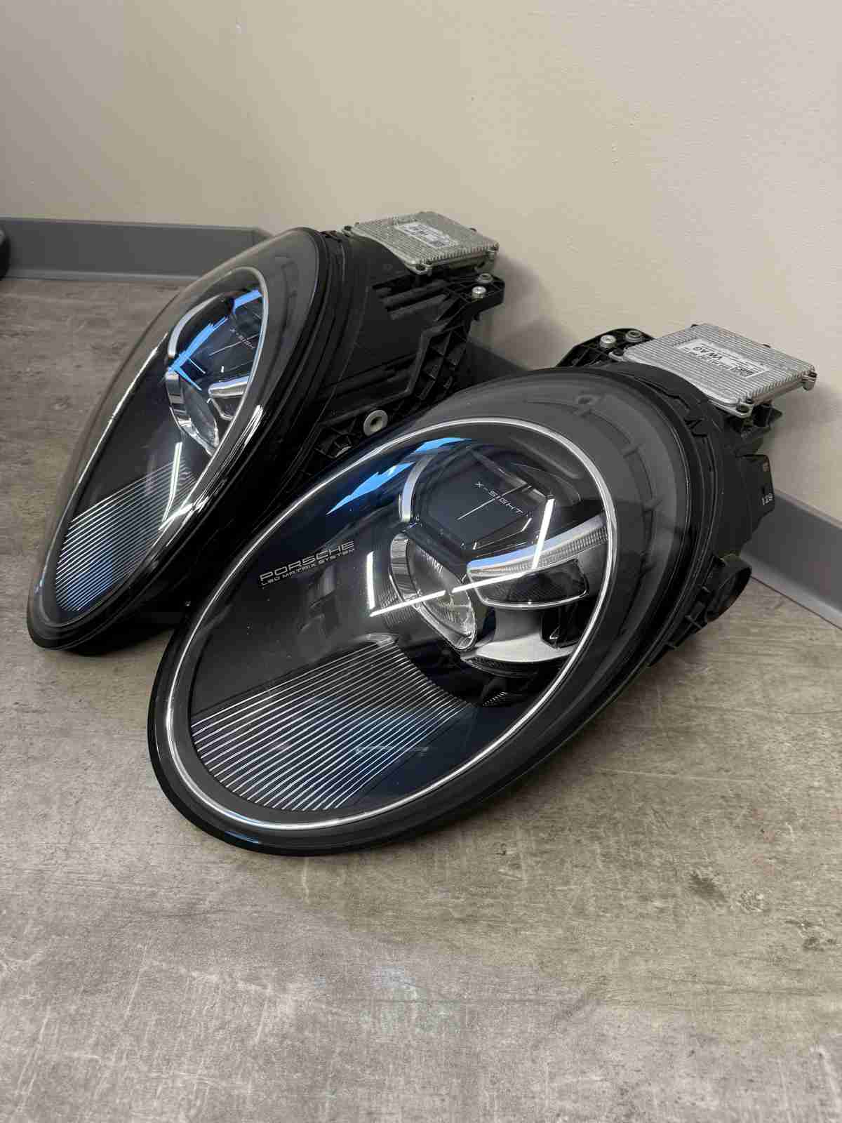 Фара левая Porsche 911 190226-105