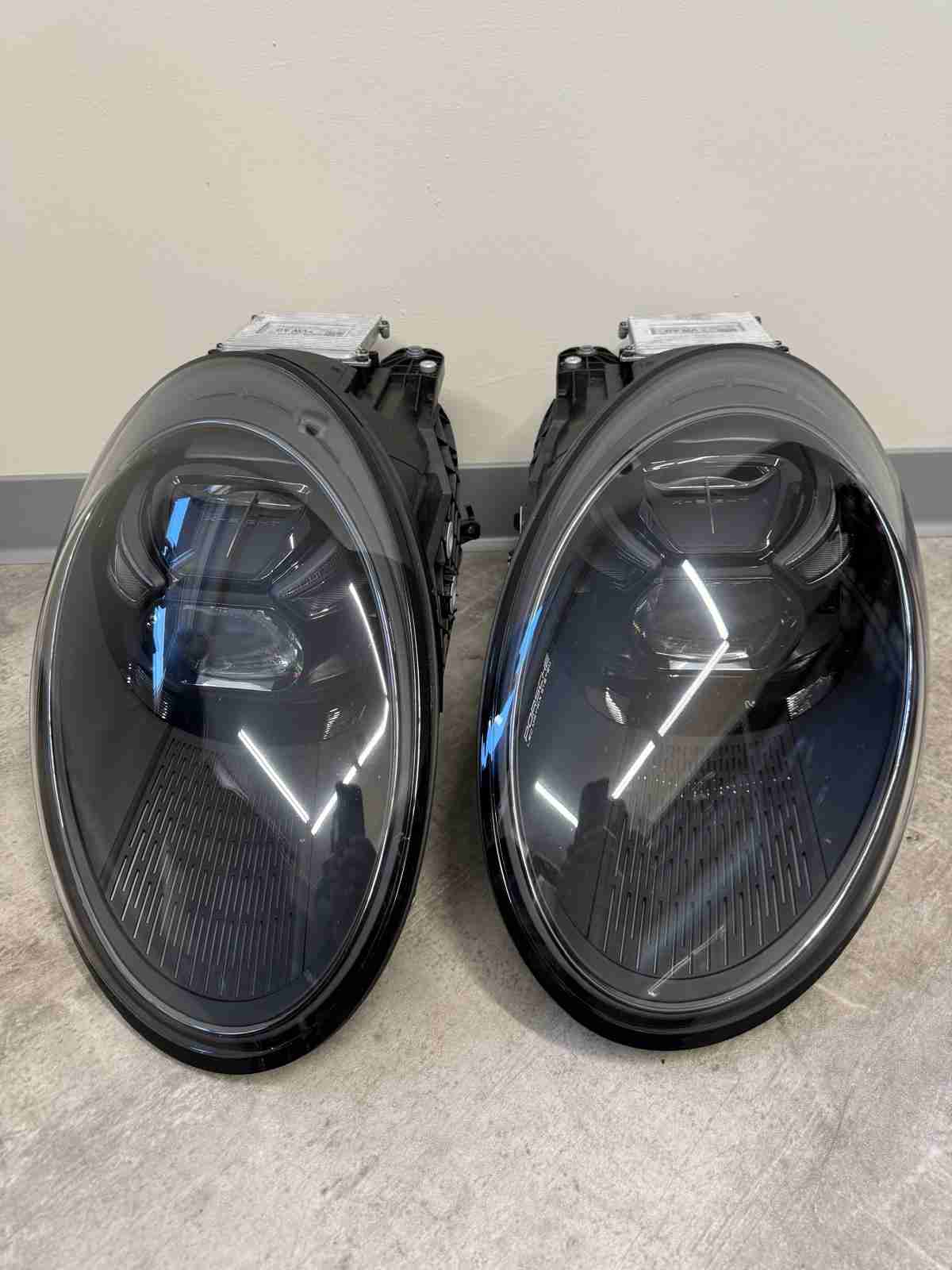 Фара левая Porsche 911 190226-107