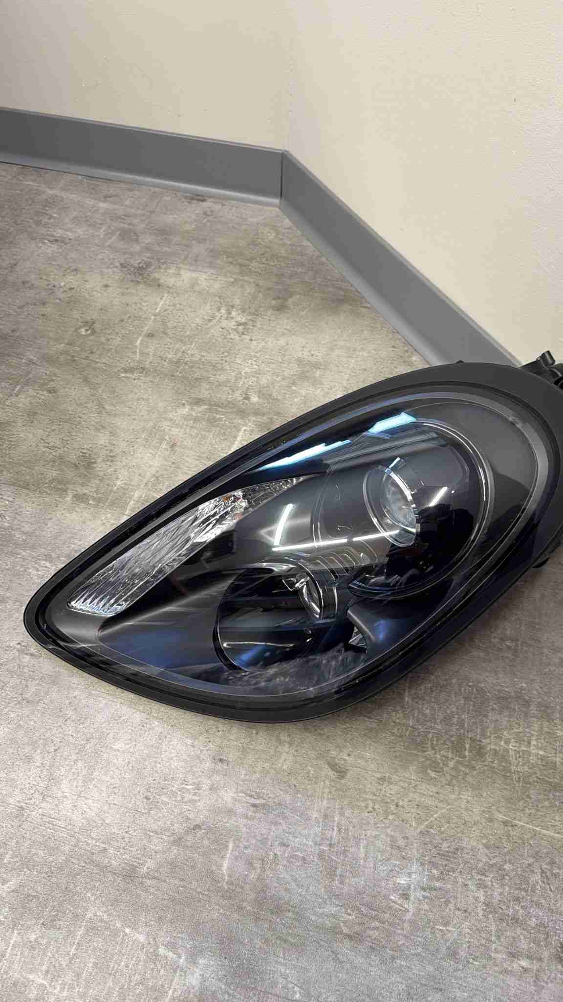 Фара левая Porsche Cayman 190226-112