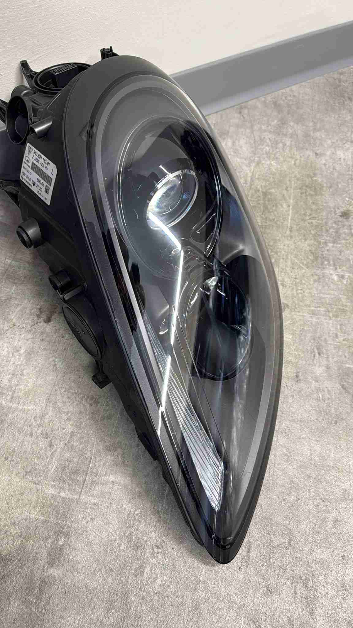 Фара левая Porsche Cayman 190226-112