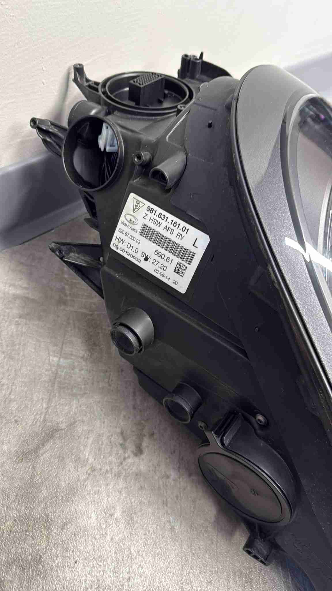 Фара левая Porsche Cayman 190226-112