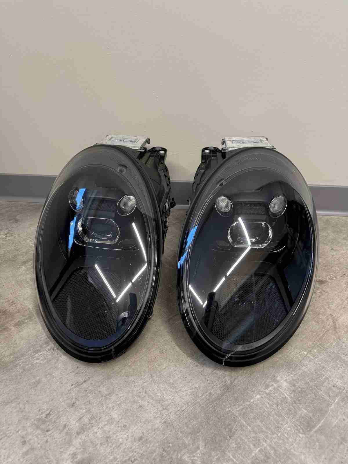 Фара левая Porsche 911 190226-172