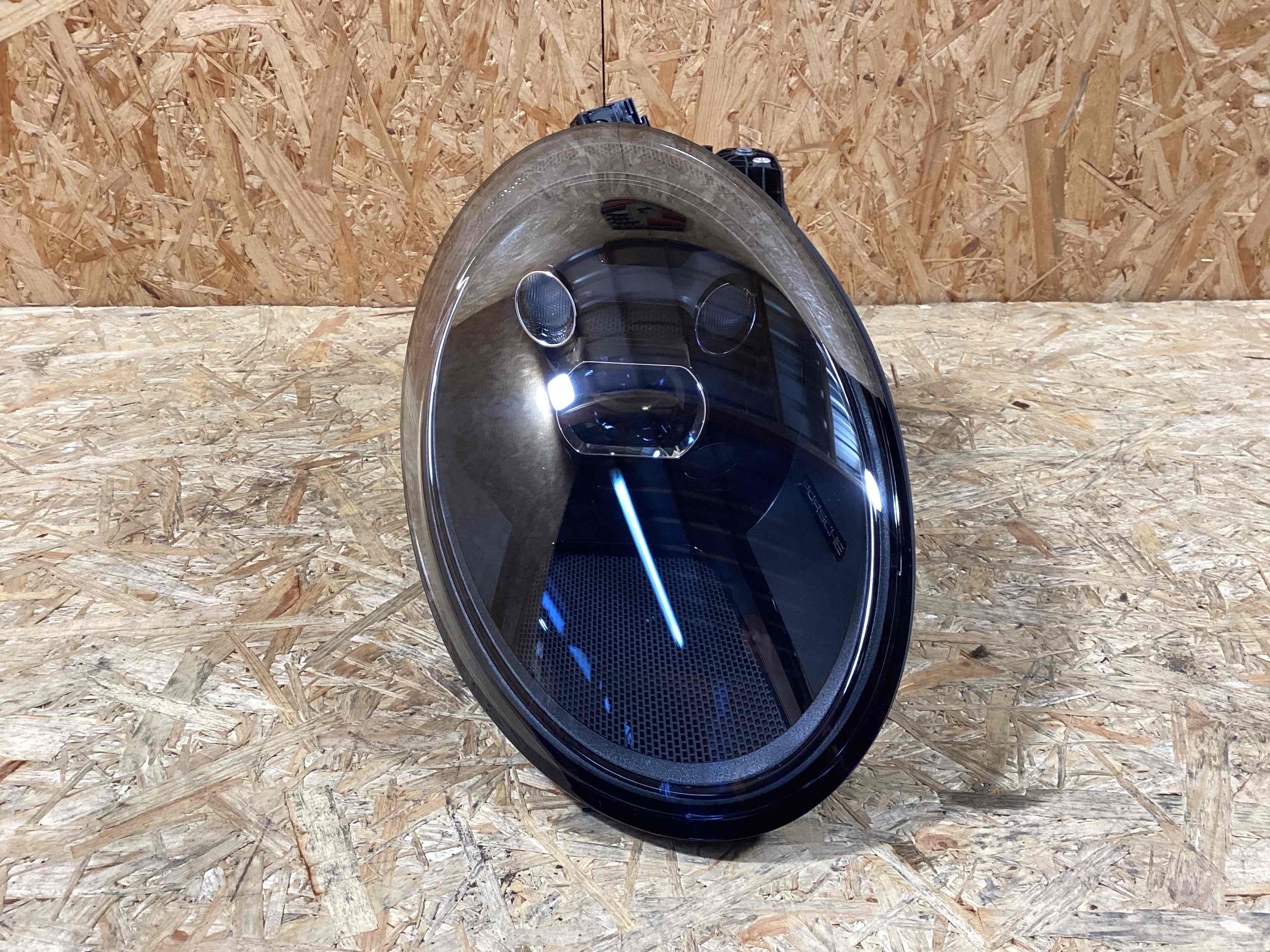 Фара левая Porsche 911 200225-118