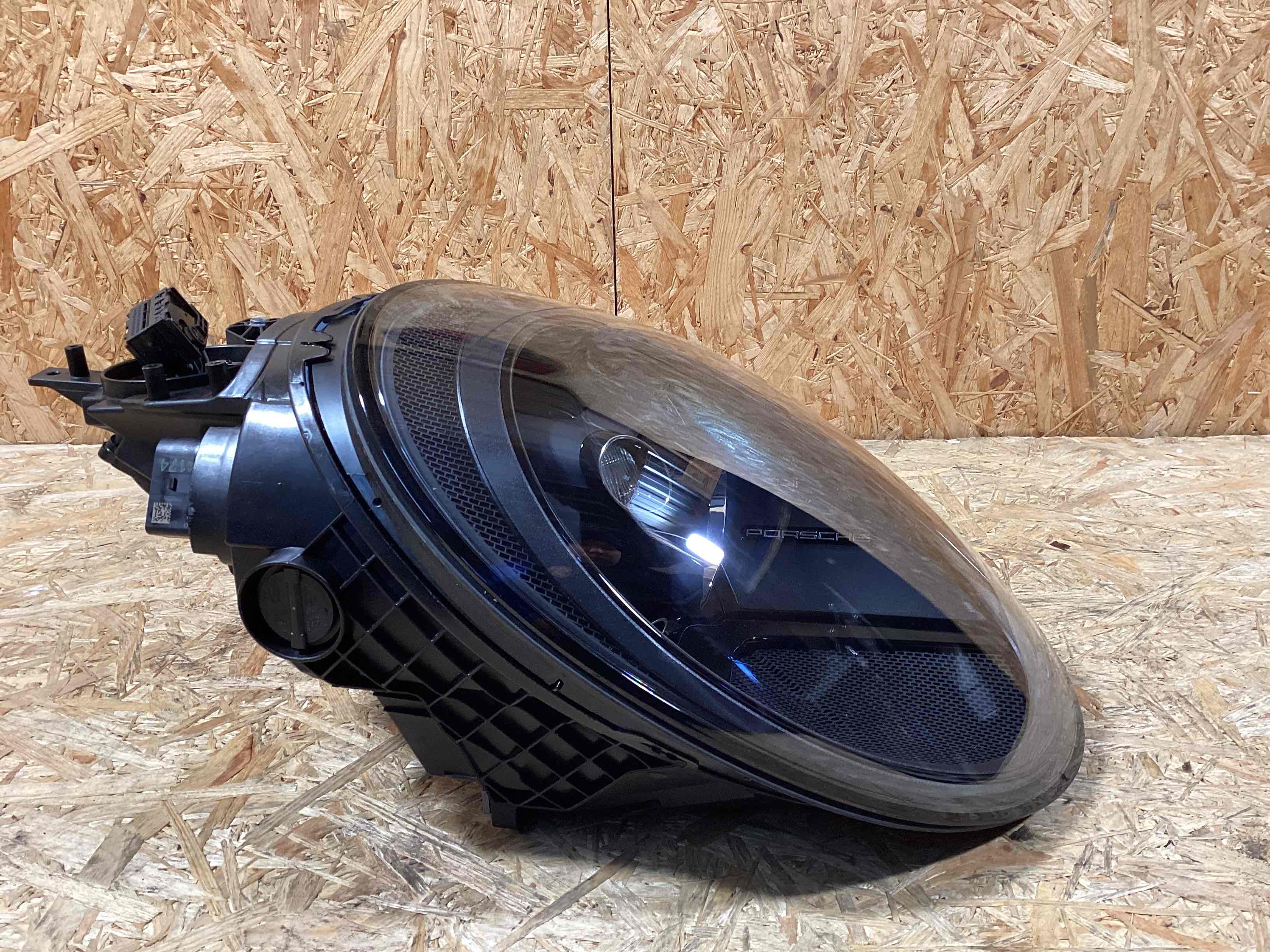 Фара левая Porsche 911 200225-118