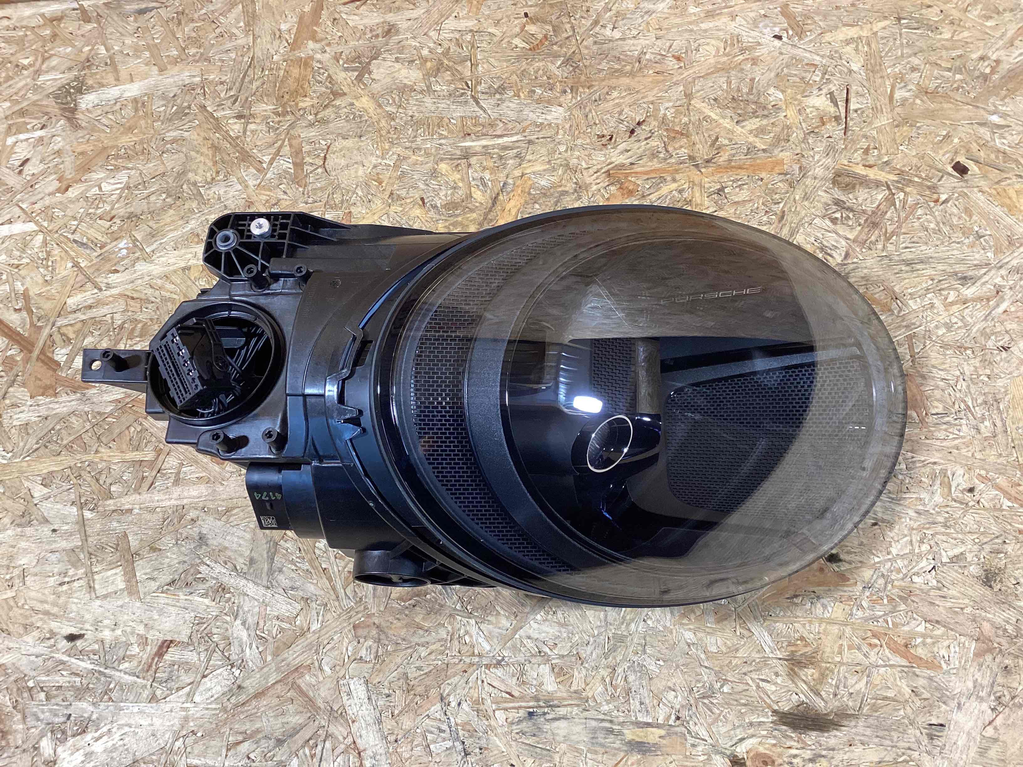 Фара левая Porsche 911 200225-118