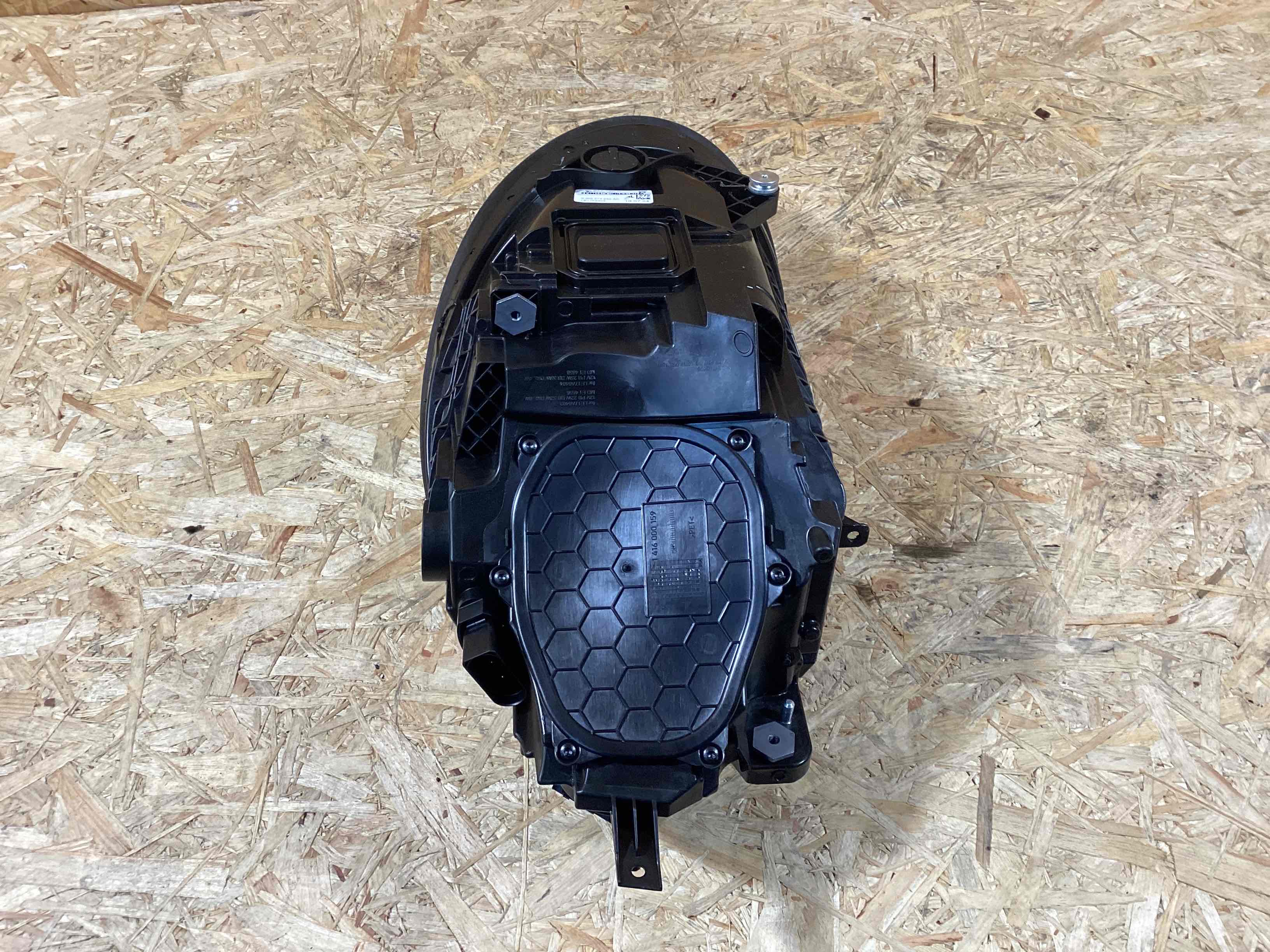 Фара левая Porsche 911 200225-118