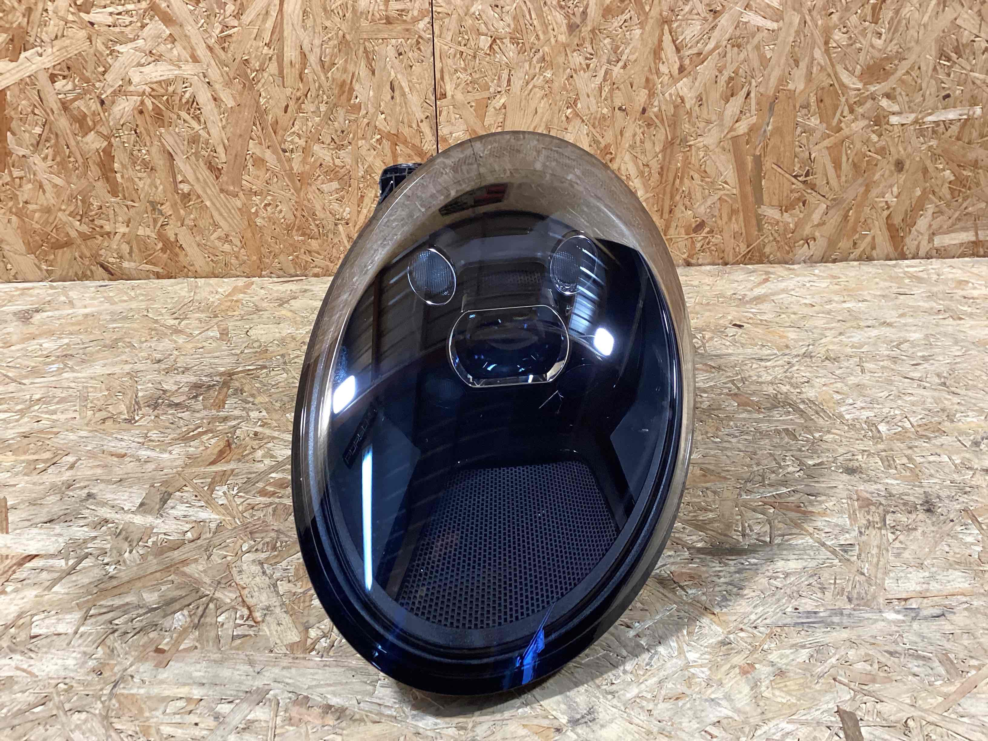 Фара левая Porsche 911 200225-118