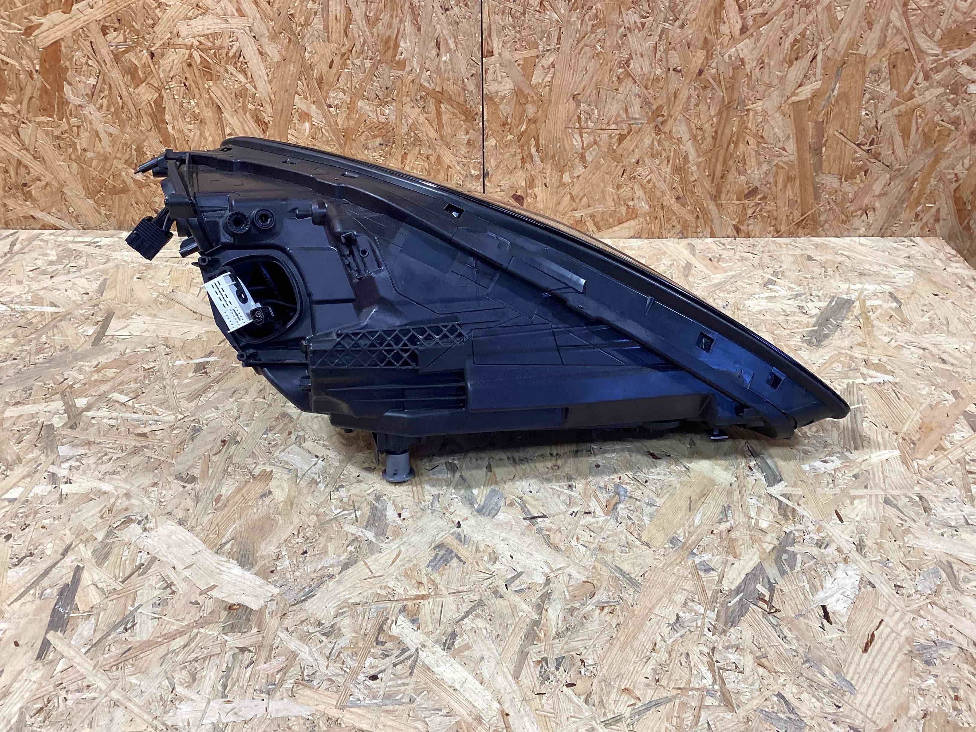 Фара левая Porsche Panamera 310326-107