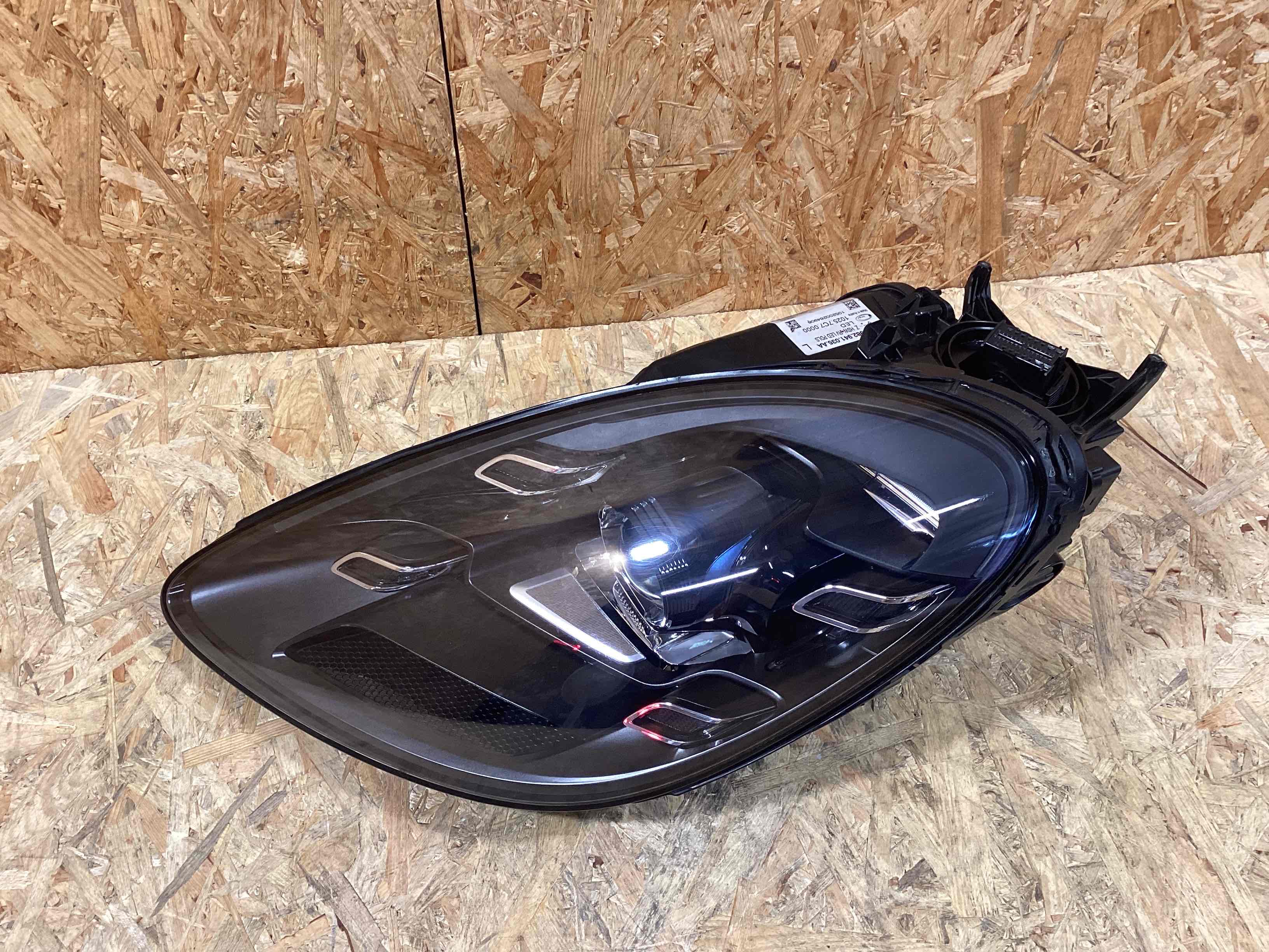 Фара левая Porsche Boxster 718 310726-102